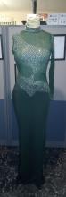 Green rhinestone single sleeve dress as seen from the front