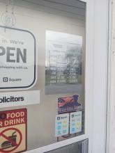 Image of updated business hours on outside door of Crafted Treasurez LLC