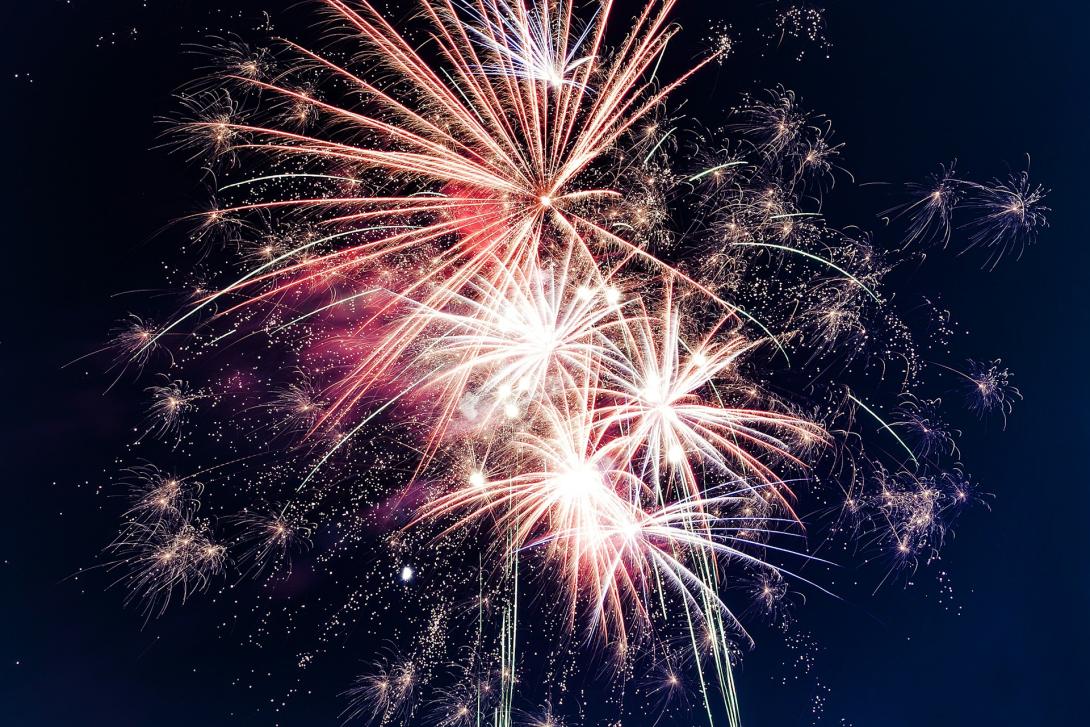 Exploding fireworks in nighttime sky